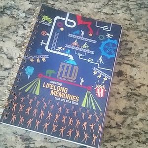 Notebook with color photos throughout